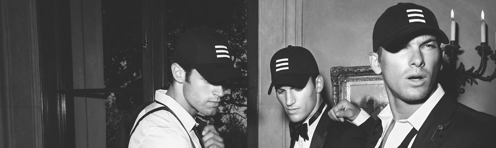 Men wearing luxury baseball hats.